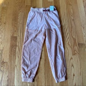 Nike Pink Tech pants size small